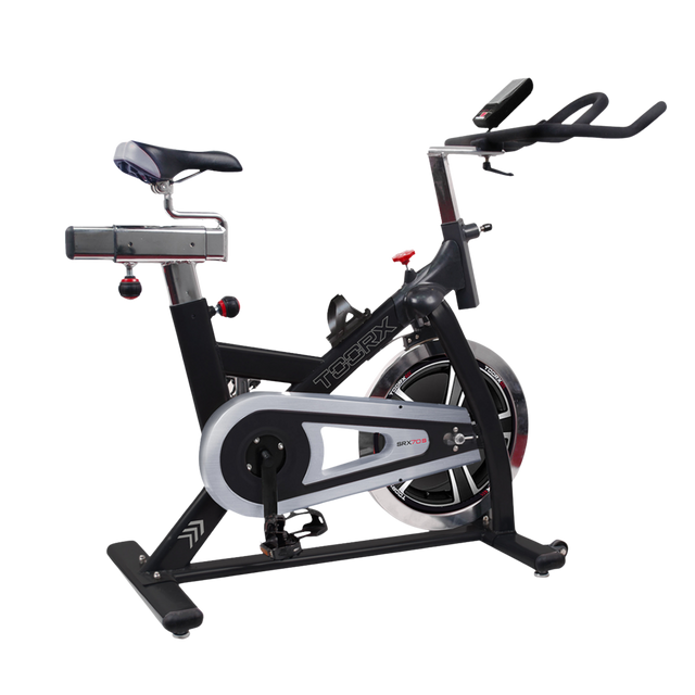 Svart Toorx SRX-70S spinningcykel i sidovy med svänghjul och justerbart styre